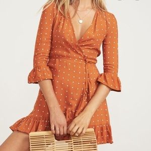 Orange and white diamond faithful brand wrap dress
